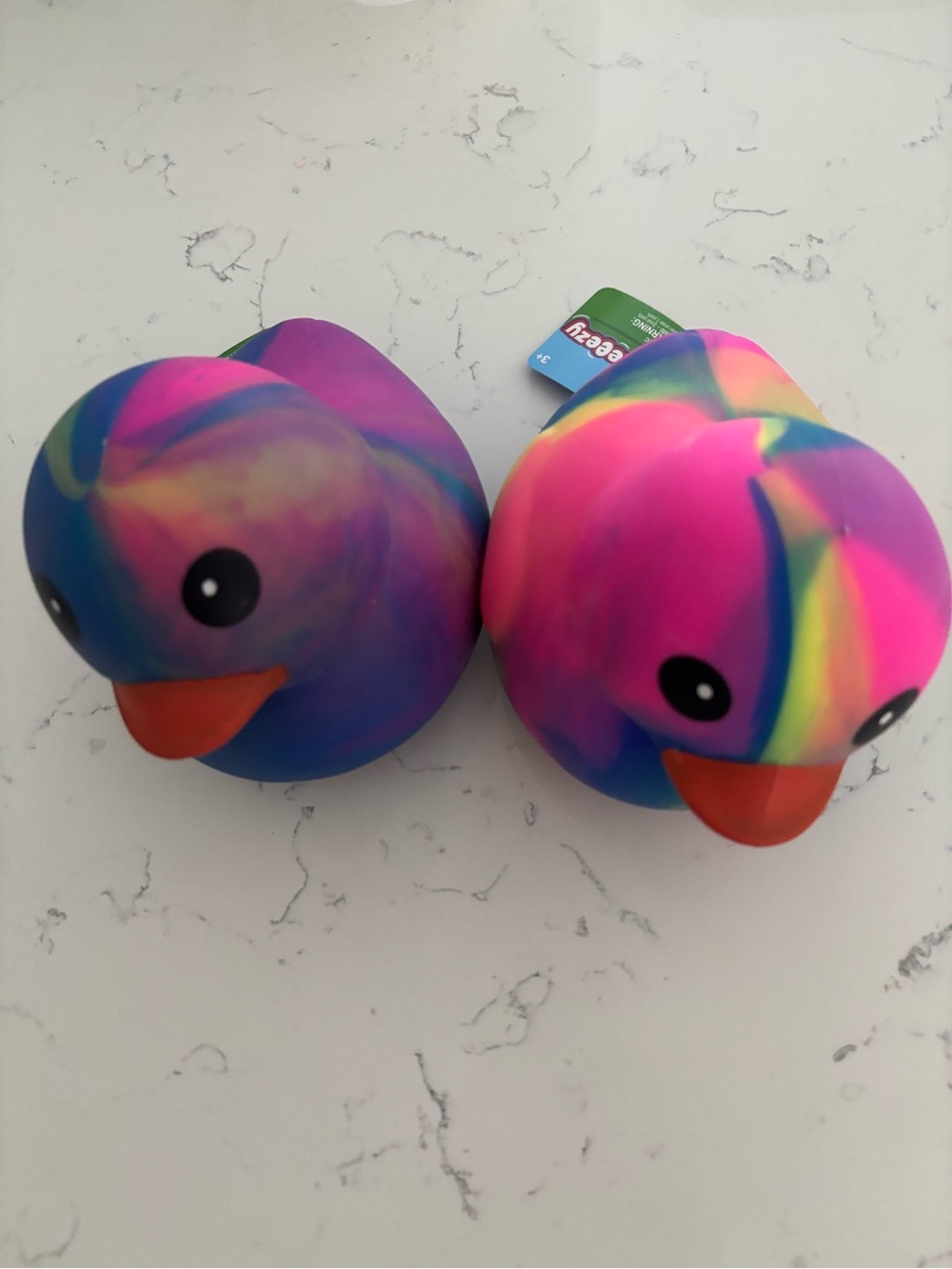 Bundle of 2 Colorful Rainbow Duck Squeezy Toy - Neon Pink Multi